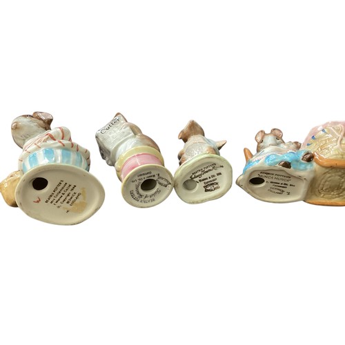 430 - A quantity of Beatrix Potter animal figures , with stamps to base, see all photos, and a Beswick phe... 