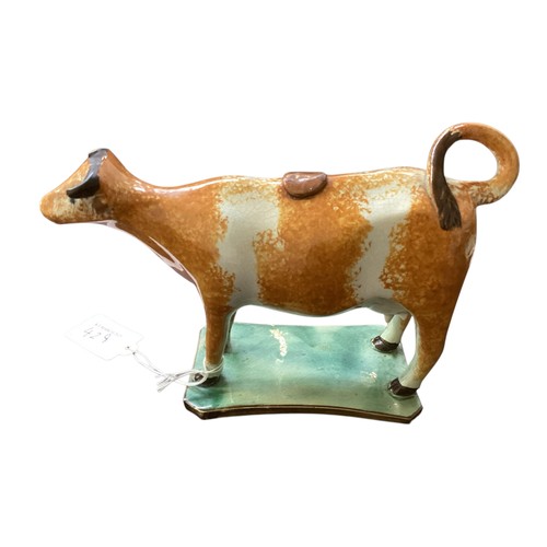 429 - Two pearlware figures of a horse and a cow, some wear. Some minor condition to one cow ear see photo... 