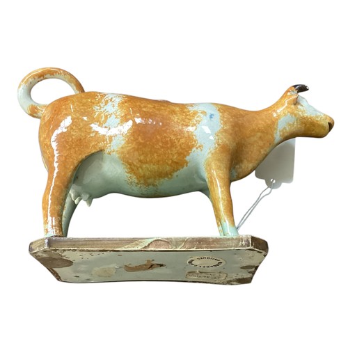 429 - Two pearlware figures of a horse and a cow, some wear. Some minor condition to one cow ear see photo... 