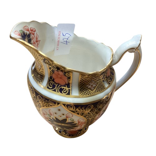 425 - A part service of Royal Crown Derby, approx 11 cups, 4 platters, 14 plates and 12 saucers. 
No crack... 