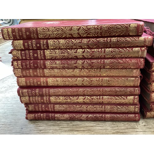 421 - 28 volumes of red bound and gilt edged books Rudyard Kipling.