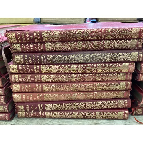 421 - 28 volumes of red bound and gilt edged books Rudyard Kipling.