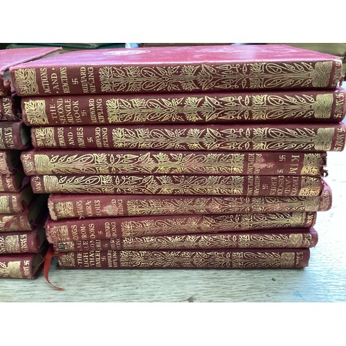 421 - 28 volumes of red bound and gilt edged books Rudyard Kipling.