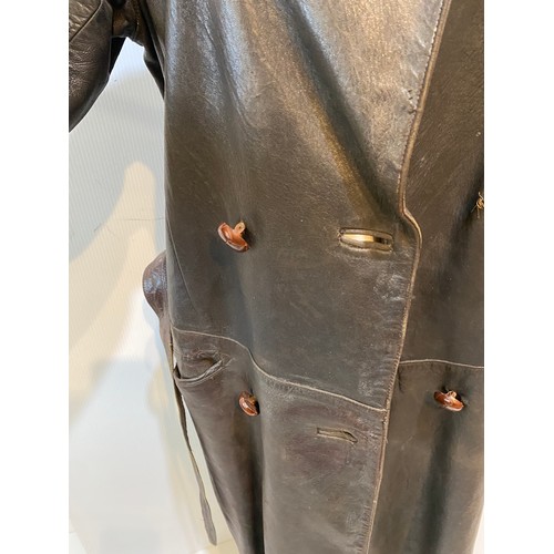 216 - Long brown leather coat with belt. Inside armpit to armpit 43cm, length 122cm. Vintage been worn ass... 