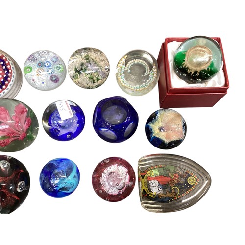 435 - A large collection of glass paperweights, including Caithness,  Perthshire, etc.