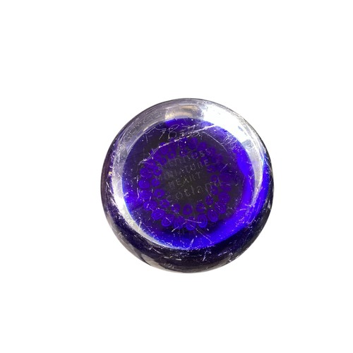 435 - A large collection of glass paperweights, including Caithness,  Perthshire, etc.