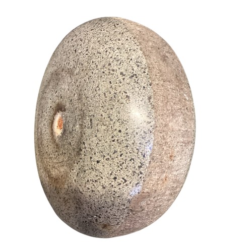 437 - A Curling stone, 26cm diameter approx.