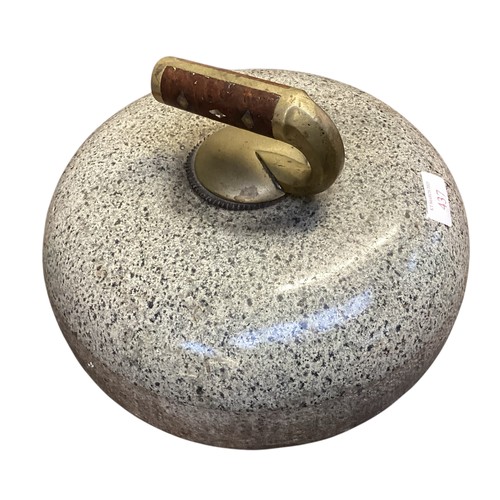 437 - A Curling stone, 26cm diameter approx.