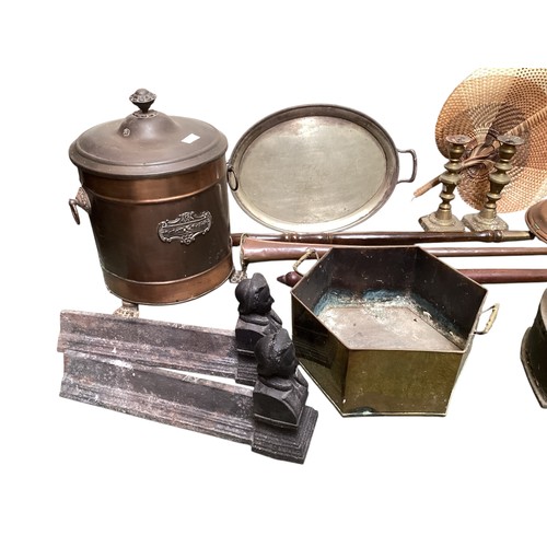 443 - A quantity of brass and copper wares to include bed warming pans, coalscuttle, brass candlesticks, c... 