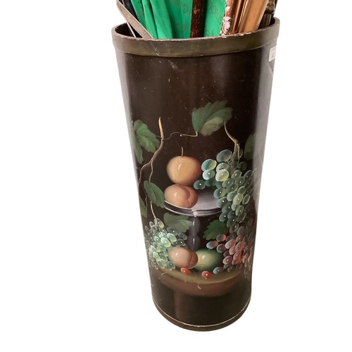 442 - A decorative floral stick stand, with a quantity of sticks.