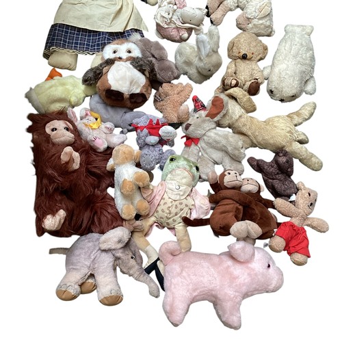 449 - A quantity of teddies and dolls, see images, all as found and sold as seen.