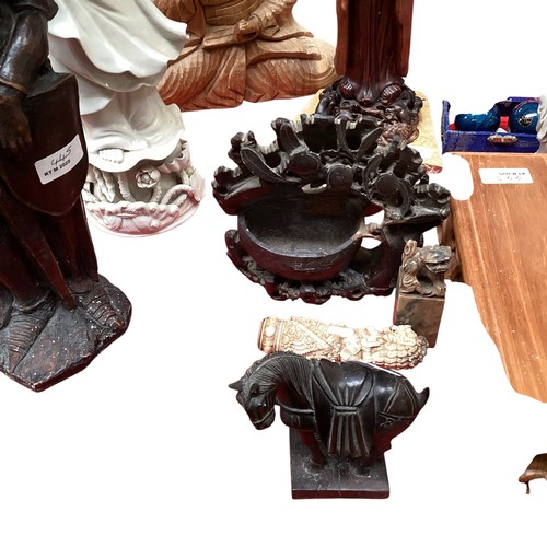 445 - A quantity of mainly Asian wares to include a Blanc de Chine Chinese Guan Yin, and a carved wooden f... 