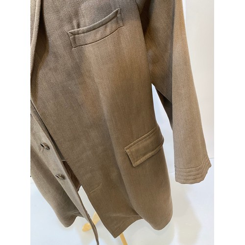 219 - Light brown wool overcoat. Condition wear and damage and marks. Inside armpit to armpit 63cm, length... 