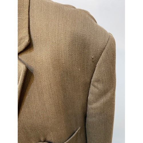 219 - Light brown wool overcoat. Condition wear and damage and marks. Inside armpit to armpit 63cm, length... 