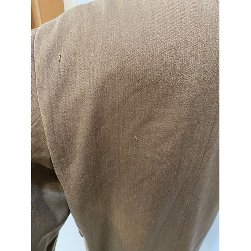 219 - Light brown wool overcoat. Condition wear and damage and marks. Inside armpit to armpit 63cm, length... 