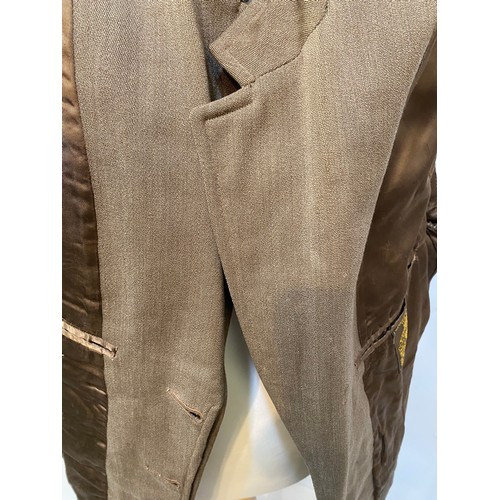 219 - Light brown wool overcoat. Condition wear and damage and marks. Inside armpit to armpit 63cm, length... 