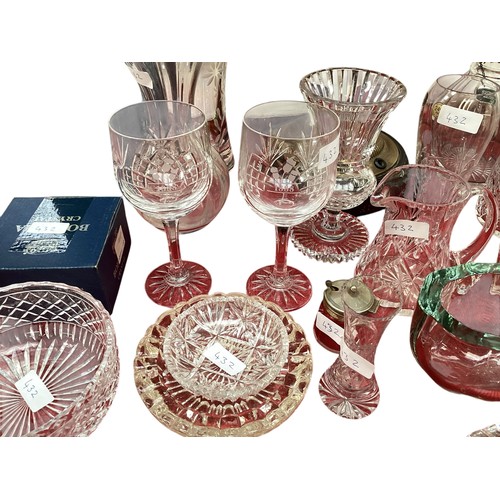 432 - A quantity of glass decanters, vases etc.  please note this is not pink glass, it is clear.  photos ... 