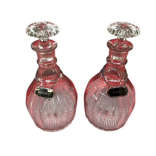 432 - A quantity of glass decanters, vases etc.  please note this is not pink glass, it is clear.  photos ... 