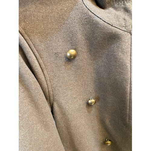 220 - Two wool army style overcoats. Green with double breasted brass style buttons, some damage/repairs a... 