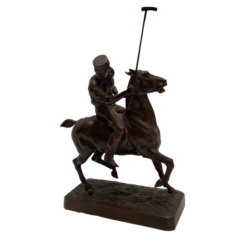 405 - A bronze of a polo player on pony, stamped to base W. Roche 1882