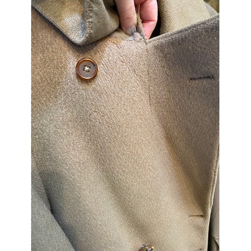 220 - Two wool army style overcoats. Green with double breasted brass style buttons, some damage/repairs a... 