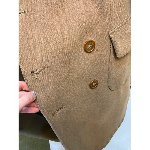 220 - Two wool army style overcoats. Green with double breasted brass style buttons, some damage/repairs a... 