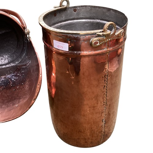 459 - A brass coal scuttle and a brass and copper bucket with handle.