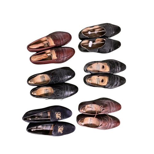 248 - Six pairs of shoes with a shoe rack for six pairs - to include, Brown loafers, black brogues, brown ... 