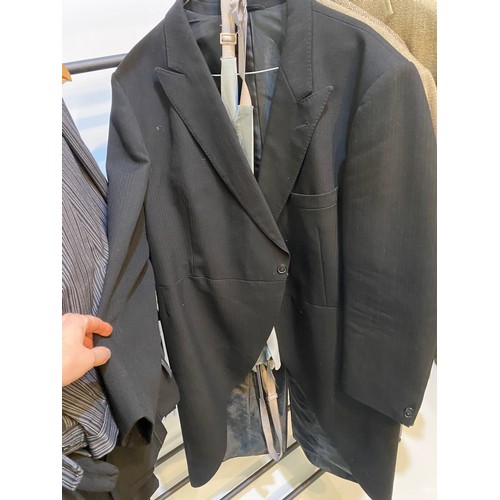 225 - Quantity of suits to include Morning coat with waistcoat and trousers, black tie suit, 3 piece grey ... 