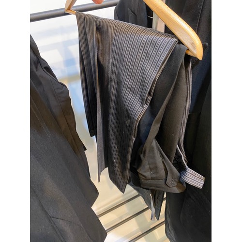 225 - Quantity of suits to include Morning coat with waistcoat and trousers, black tie suit, 3 piece grey ... 