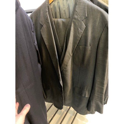 225 - Quantity of suits to include Morning coat with waistcoat and trousers, black tie suit, 3 piece grey ... 