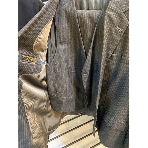 225 - Quantity of suits to include Morning coat with waistcoat and trousers, black tie suit, 3 piece grey ... 