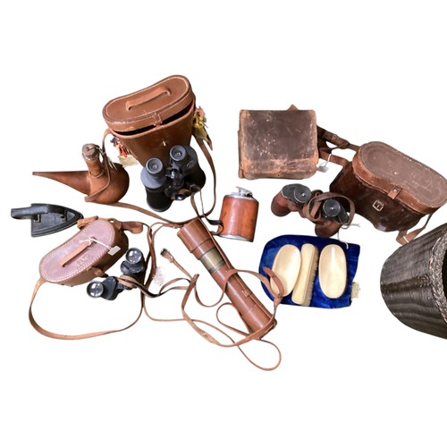 413 - A quantity of vintage collectables to include militaria items. Including brown cased binoculars, tel... 