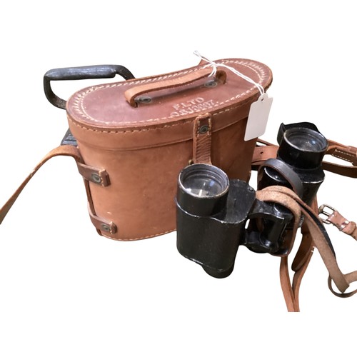 413 - A quantity of vintage collectables to include militaria items. Including brown cased binoculars, tel... 