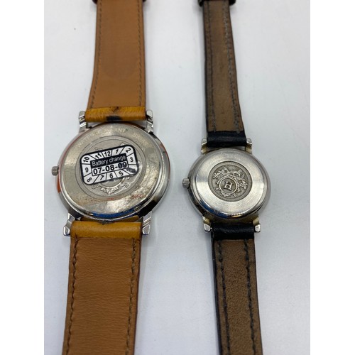 356 - THREE HERMES WATCHES to include a gents white metal and yellow metal wrist watch on brown leather st... 