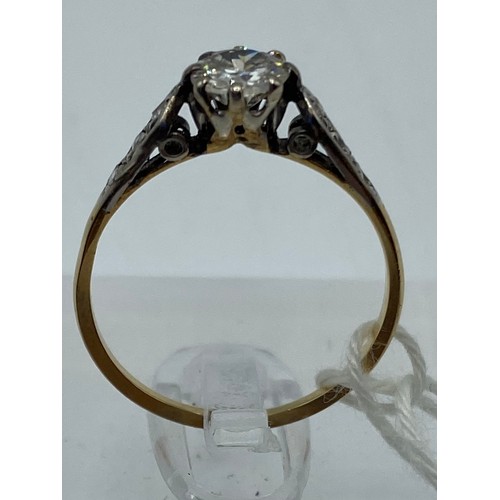 277 - An 18ct gold and white metal diamond ring, central brilliant cut 5mm diamond, with rose cut diamond ... 