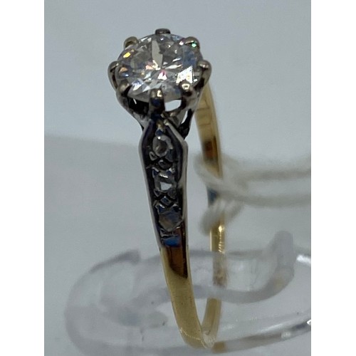 277 - An 18ct gold and white metal diamond ring, central brilliant cut 5mm diamond, with rose cut diamond ... 