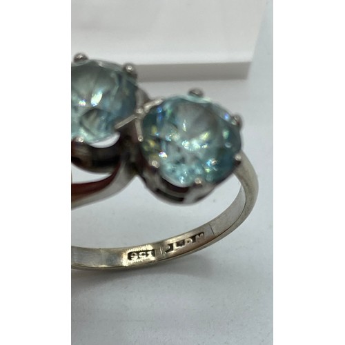 284 - A 9ct gold and platinum 2 stone aquamarine ring, pair of free cut aquamarines each in a 6 claw setti... 