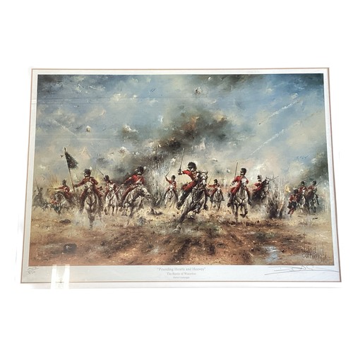 562 - Four framed and glazed pictures of Militaria interest