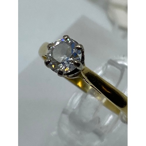 290 - An 18ct gold single stone diamond ring, brilliant cut, approx 6mm, diamond in 6 claw setting, size 0... 