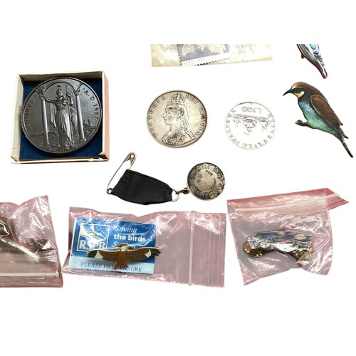 493 - A collection of sterling silver and white metal items together with coins, medallions and a brass co... 