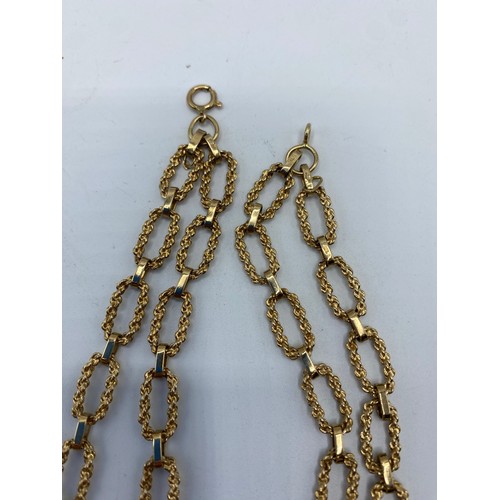 264 - A 9ct gold single/double fancy link necklace, 82cm, 38g