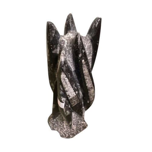 490 - An Orthoceres statue. 34cm(h)