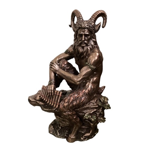 489 - A gilt metal model of a seated Pan, Studio Collection by Veronese Design. 29cm(h).,Original box.