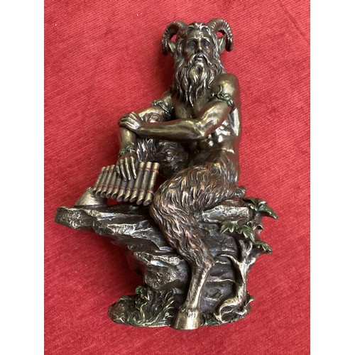 489 - A gilt metal model of a seated Pan, Studio Collection by Veronese Design. 29cm(h).,Original box.