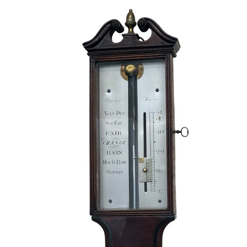 455 - A long case clock and a barometer.