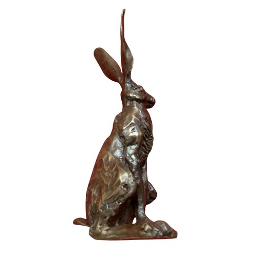 486 - A collection of bronze and composite resin models of animals.Otter, rabbits and hares.