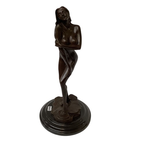 484 - Three bronze models of nude ladies. One unsigned on hardstone base, The others signed Aldo Vitaleh, ... 