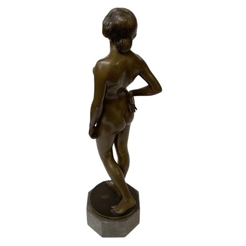 482 - Ernst Wagner (1877-1951) A Bronze model of a standing nude lady. Etched signature. On a hexagonal ha... 