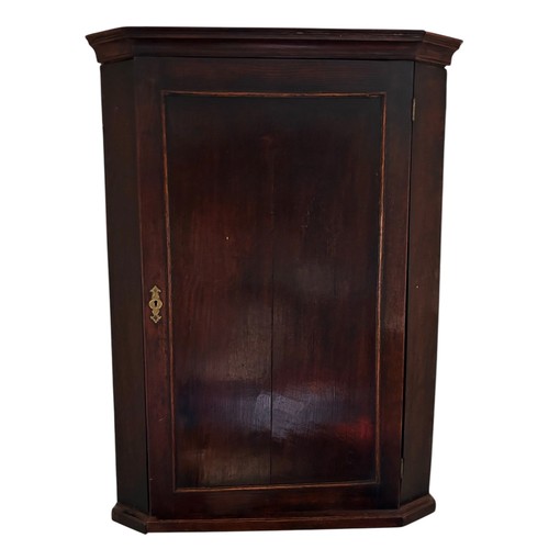 637 - A mahogany linen press with cupboard above and brass hanging rail and three drawers to base, 130 cm ... 